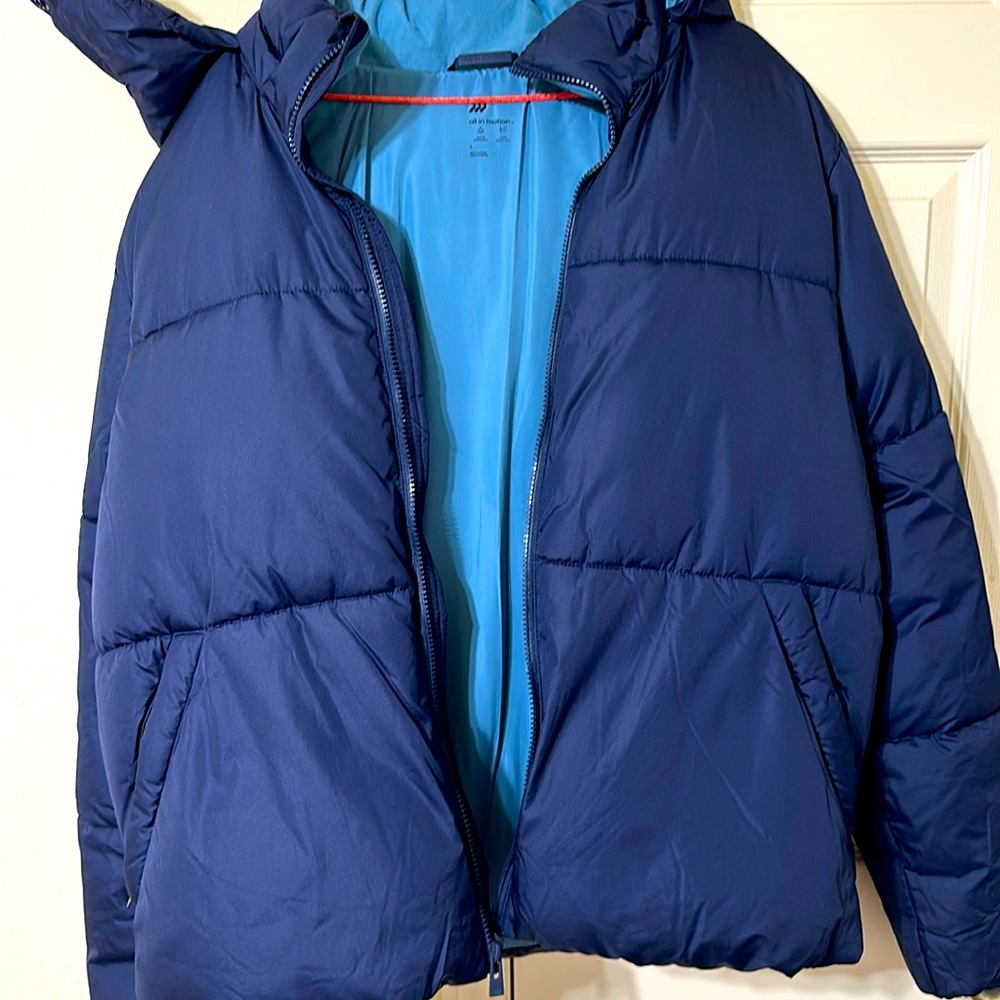 All in motion winter jacket. Made in Vietnam. Water resistant and wind resistant